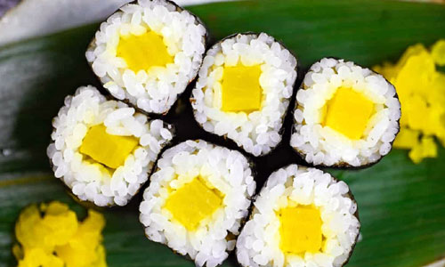 Pickled Radish Roll served cold on a tray